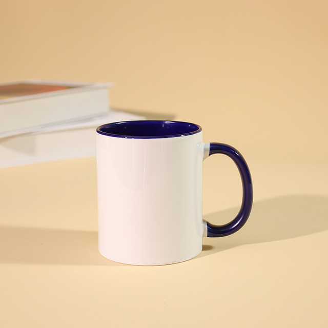 White ceramic mug with blue rim